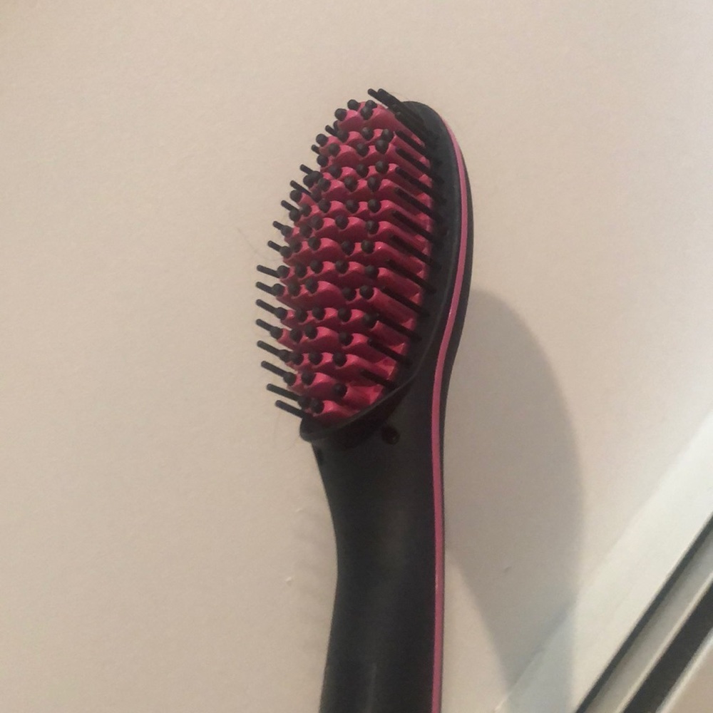 A heat hair brush straightener